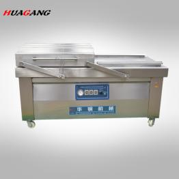 Vacuum packing machine for meat